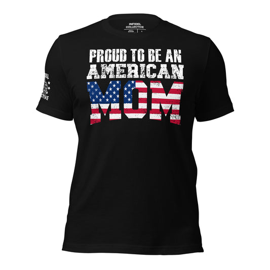 Ghosted mockup of patriotic women's t-shirt in black with white font stating Proud to be An American Mom - with Mom in colors of the USA flag. Offered by Infidel Collective in sizes from XS to 5X.