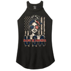 A black sleeveless racerback tank top featuring a patriotic graphic of a woman with an American flag bandana and sunglasses, set against a distressed American flag background with the text 'USA MADE IN AMERICA' printed below.