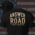 Answer to the Road It Waits for No One distressed lettering design back print black tee from Infidel Collective