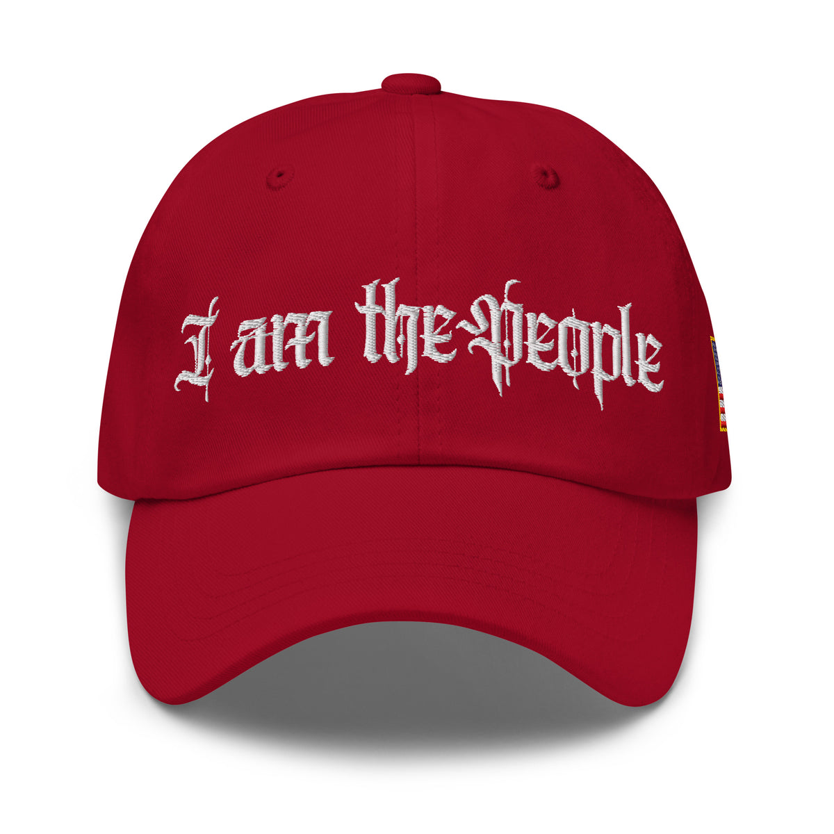 Red low-profile dad hat with embroidered I Am the People front design, front view