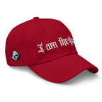 Red low-profile dad hat with embroidered I Am the People design, right front view