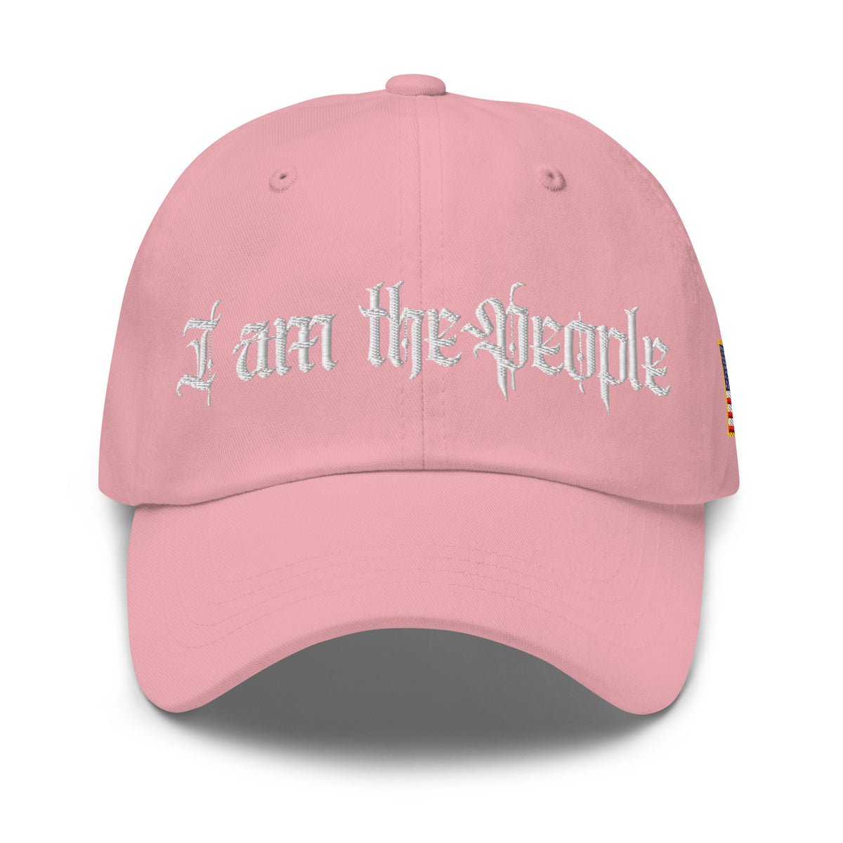 Pink low-profile dad hat with embroidered I Am the People front design, front view