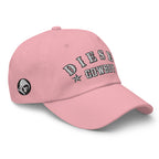 Pink low-profile dad hat with embroidered Diesel Cowboy design, right front view