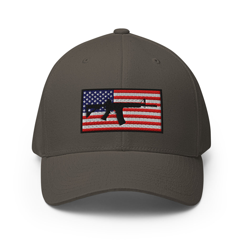 Dark gray cap with American flag and gun graphic on a white background