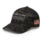 Left-front view of multicam black Welcome to the Shitshow Flexfit hat
