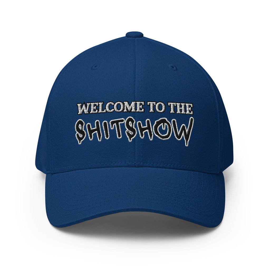 Blue cap with text 'WELCOME TO THE SHIT$HOW' on a white background