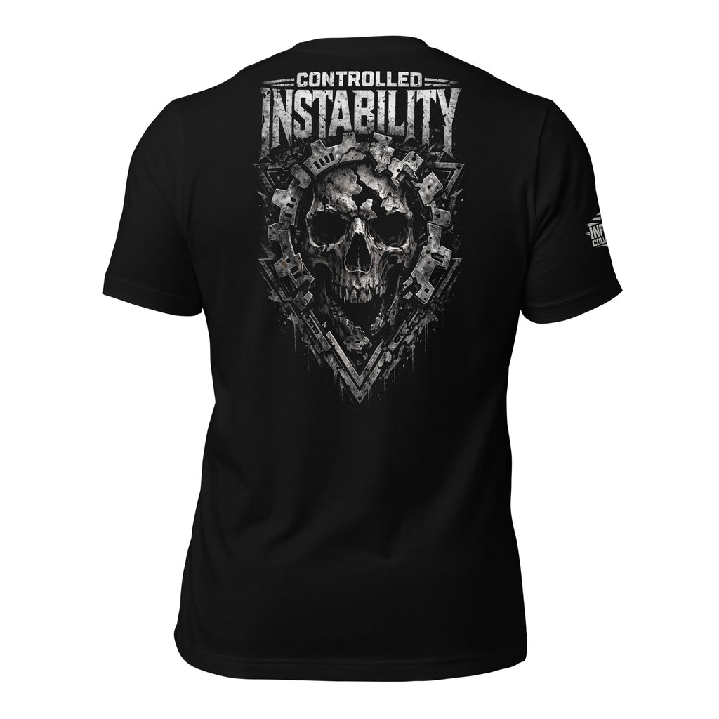 Black tee with Controlled Instability back print featuring distressed skull graphic surrounded by industrial metal and mechanical elements