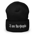 Black cuffed knit beanie with embroidered I Am the People front design, front view