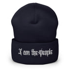 Navy cuffed knit beanie with embroidered I Am the People front design, front view