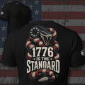 1776 Is the Standard American flag rattlesnake design back print black tee from Infidel Collective