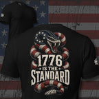 1776 Is the Standard American rattlesnake back print black tee from Infidel Collective