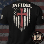 Black short-sleeve t-shirt shown from the back, featuring a large distressed graphic with the word "INFIDEL" above a red cross over a stylized American flag. A circular "Made in USA" badge appears in the lower right corner.