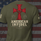 Heavyweight Deus Vult American Infidel military green back-print tee with crimson cross, skull, scripture and sleeve hits