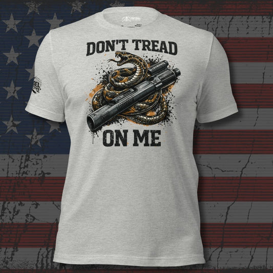 Gray t-shirt with snake and gun graphic and 'Don't Tread on Me' text on an American flag background