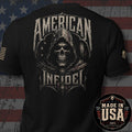 Black short-sleeve graphic T-shirt shown from the back, featuring a large distressed hooded skull design with the words “AMERICAN INFIDEL.” The shirt is photographed against a rustic American flag background, with a circular “Made in USA 100% American Made” badge overlaid in the lower right corner.