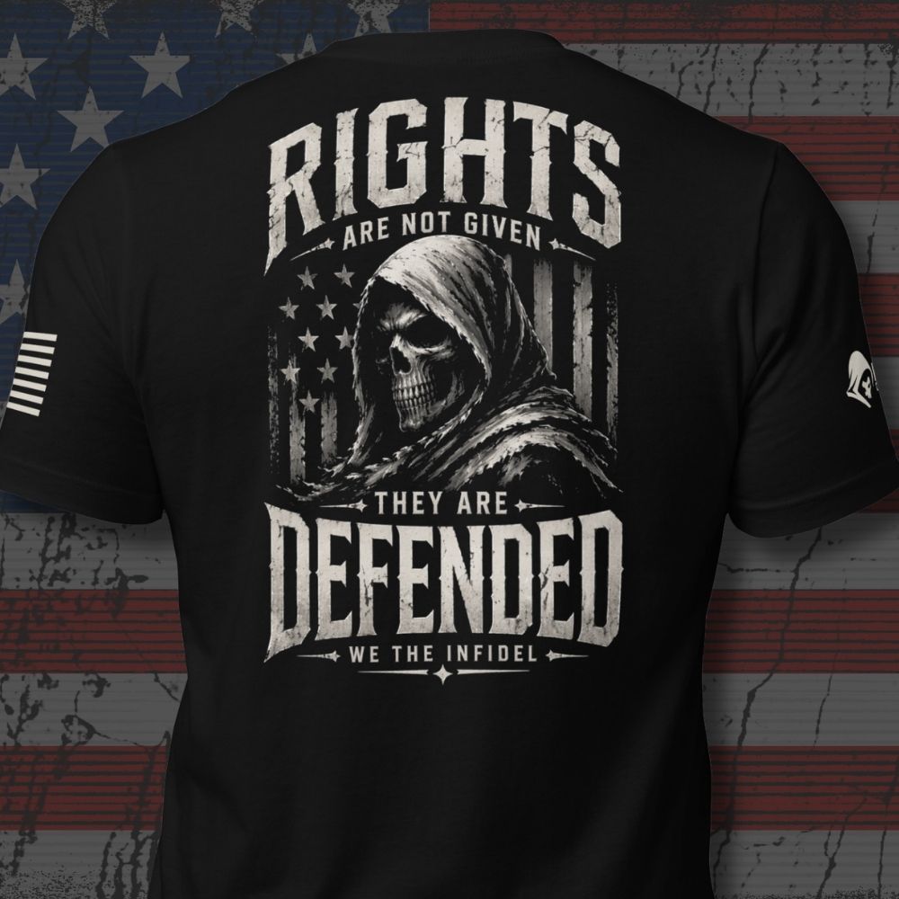 Black short-sleeve t-shirt shown from the back, featuring a large distressed white graphic of a hooded skull over an American flag with the text 'RIGHTS ARE NOT GIVEN THEY ARE DEFENDED WE THE INFIDEL'. The shirt is displayed against a rustic American flag backdrop.