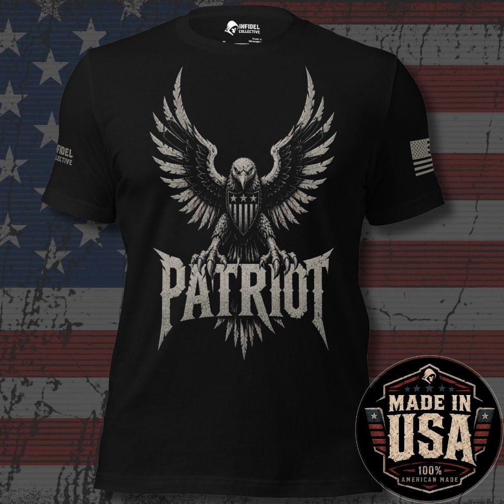 A black short-sleeve graphic T-shirt featuring a large distressed eagle with spread wings and the word "PATRIOT" in bold lettering below. USA American flag on the left sleeve and brand logo 'INFIDEL COLLECTIVE' on the right sleeve. The shirt is shown against a rustic American flag background. 100% Made in the USA.
