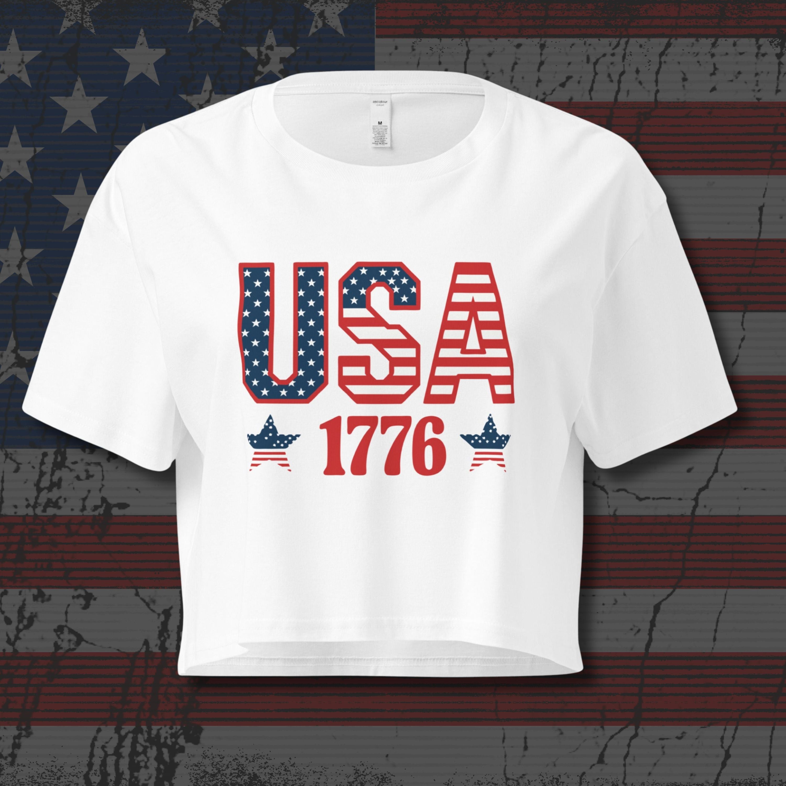 White crop top with text that says 'USA 1776' on distressed American flag as a background