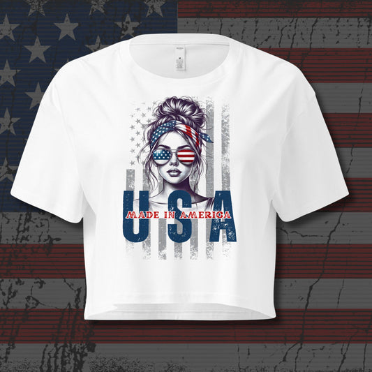 White t-shirt with 'Made in America' graphic design on an American flag background