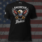 Black t-shirt with an eagle design and 'American Badass' text on a distressed American flag background.