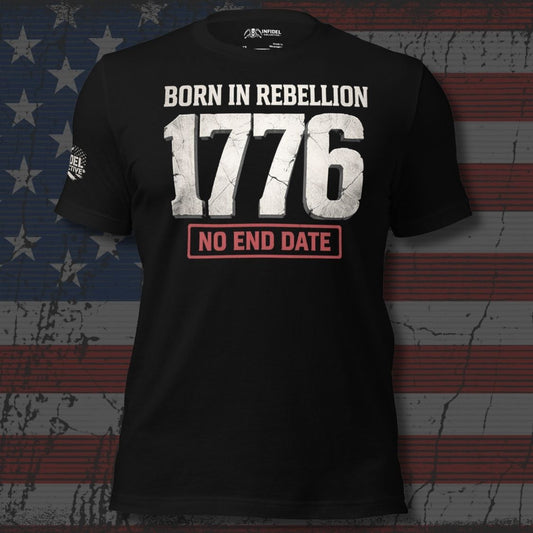 Black t-shirt with 'Born in Rebellion 1776 No End Date' text on an American flag background