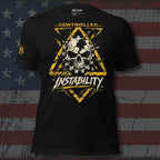 Black tee with Controlled Instability front print featuring cracked skull, industrial gear elements, yellow hazard symbol, and distressed graphics