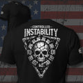 Controlled Instability cracked skull inside a triangular machine frame design back print black tee from Infidel Collective