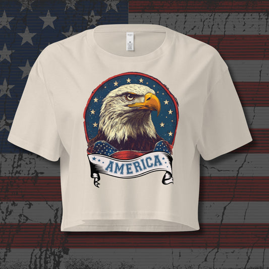 Beige t-shirt with an eagle and 'America' design on a distressed American flag background