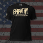 Black t-shirt with 'EMPATHY BACKORDERED' text on a distressed American flag background