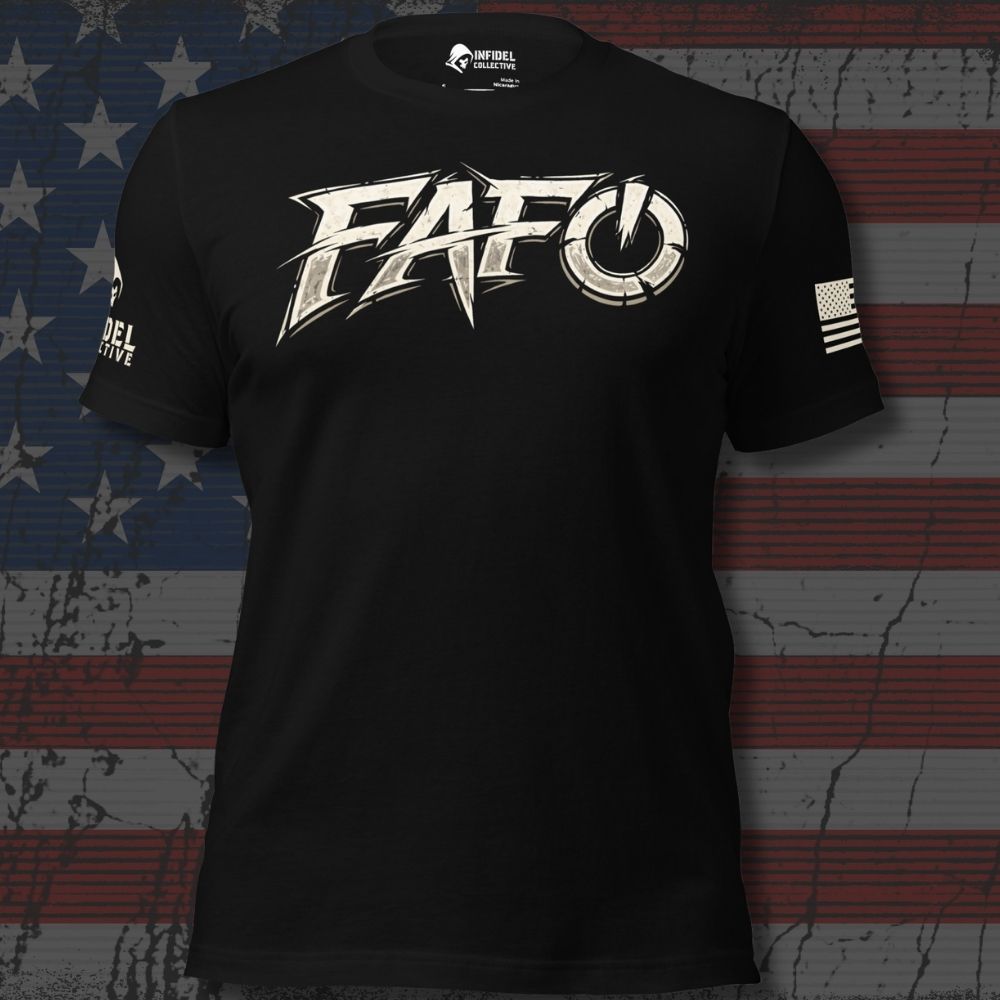 A black short-sleeve t-shirt with a large distressed white 'FAFO' graphic across the chest, featuring a power symbol inside the 'O' and additional white text on the right sleeve. The shirt is displayed against a distressed American flag background.