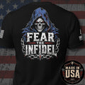 Black short-sleeve t-shirt shown from the back, featuring a large graphic of a hooded skull with red eyes and the text 'FEAR THE INFIDEL' in distressed white and gray lettering. The shirt is displayed against a rustic American flag background, with a circular 'MADE IN USA 100% AMERICAN MADE' badge in the lower right corner.