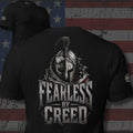 Fearless by Creed Spartan helmet and American flag design back print black tee from Infidel Collective