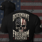 Black t-shirt with 'Descendant of Freedom Fighters' design on an American flag background
