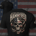 Getting Star Spangle Hammered flag skull wrapped in a rattlesnake design back print black tee from Infidel Collective