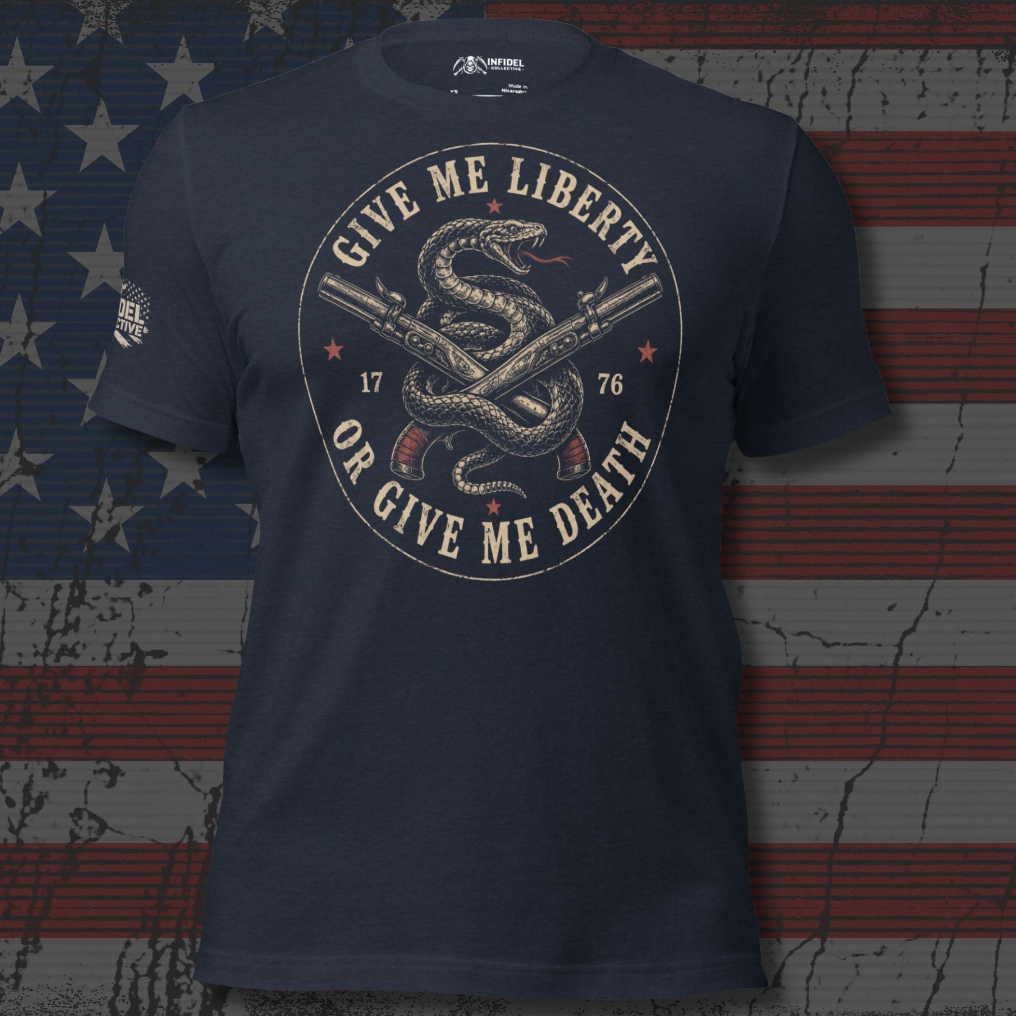 Heather navy tee with front print featuring a rattlesnake wrapped around crossed flintlock pistols and the text Give Me Liberty or Give Me Death 1776