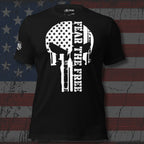 Black t-shirt with a white skull design and 'Fear the Free' text on an American flag background.