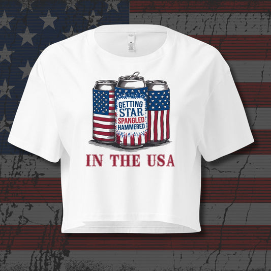White t-shirt with graphic design of beer cans and text on an American flag background
