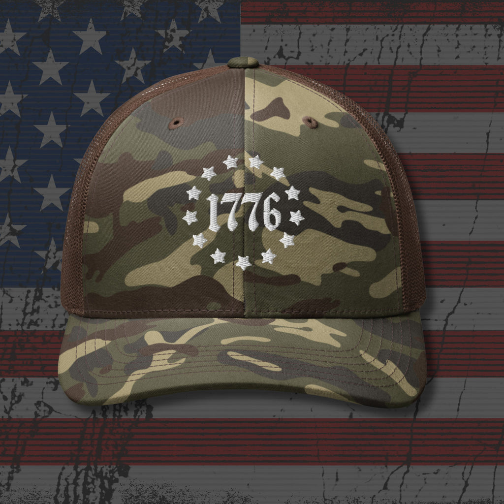 Camouflage cap with '1776' design on an American flag background