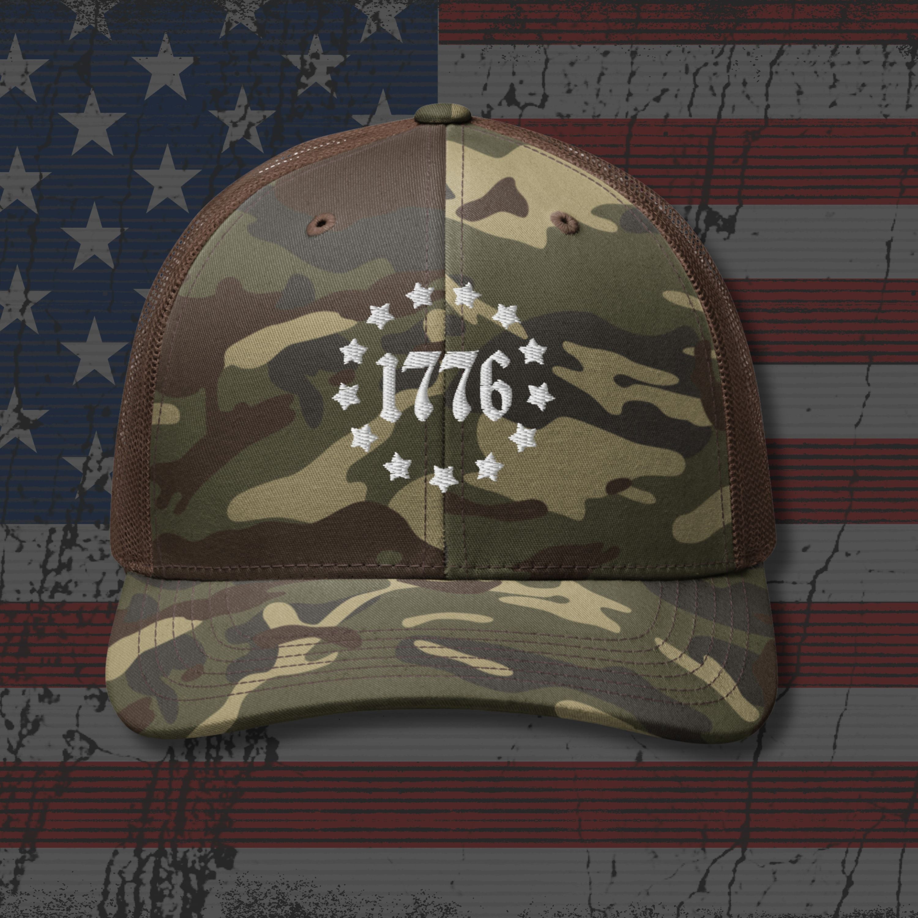 Camouflage cap with '1776' design on an American flag background