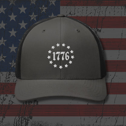 Gray cap with '1776' design on an American flag background