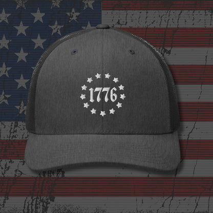 Gray cap with '1776' design on an American flag background