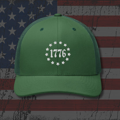 Green cap with '1776' design on an American flag background