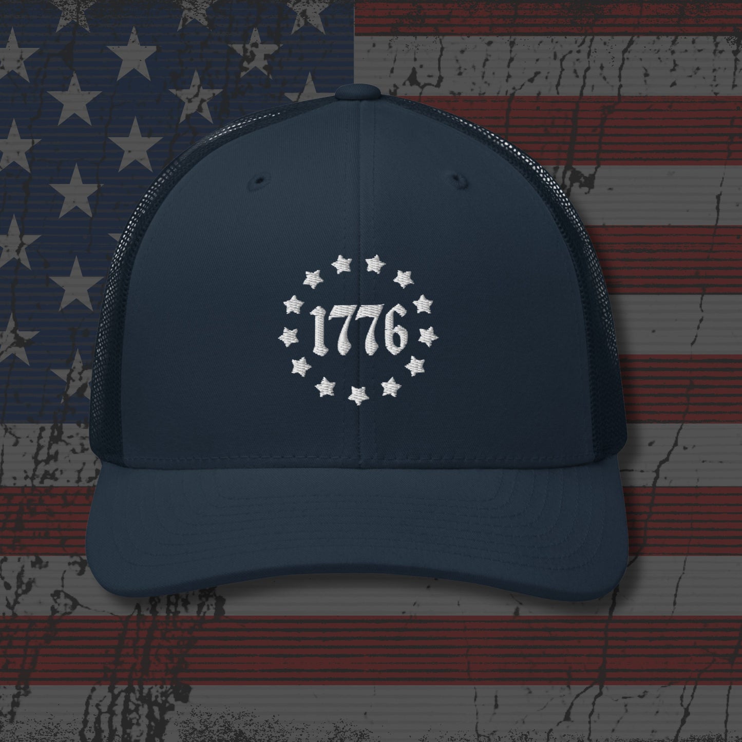 Navy blue cap with '1776' design on an American flag background