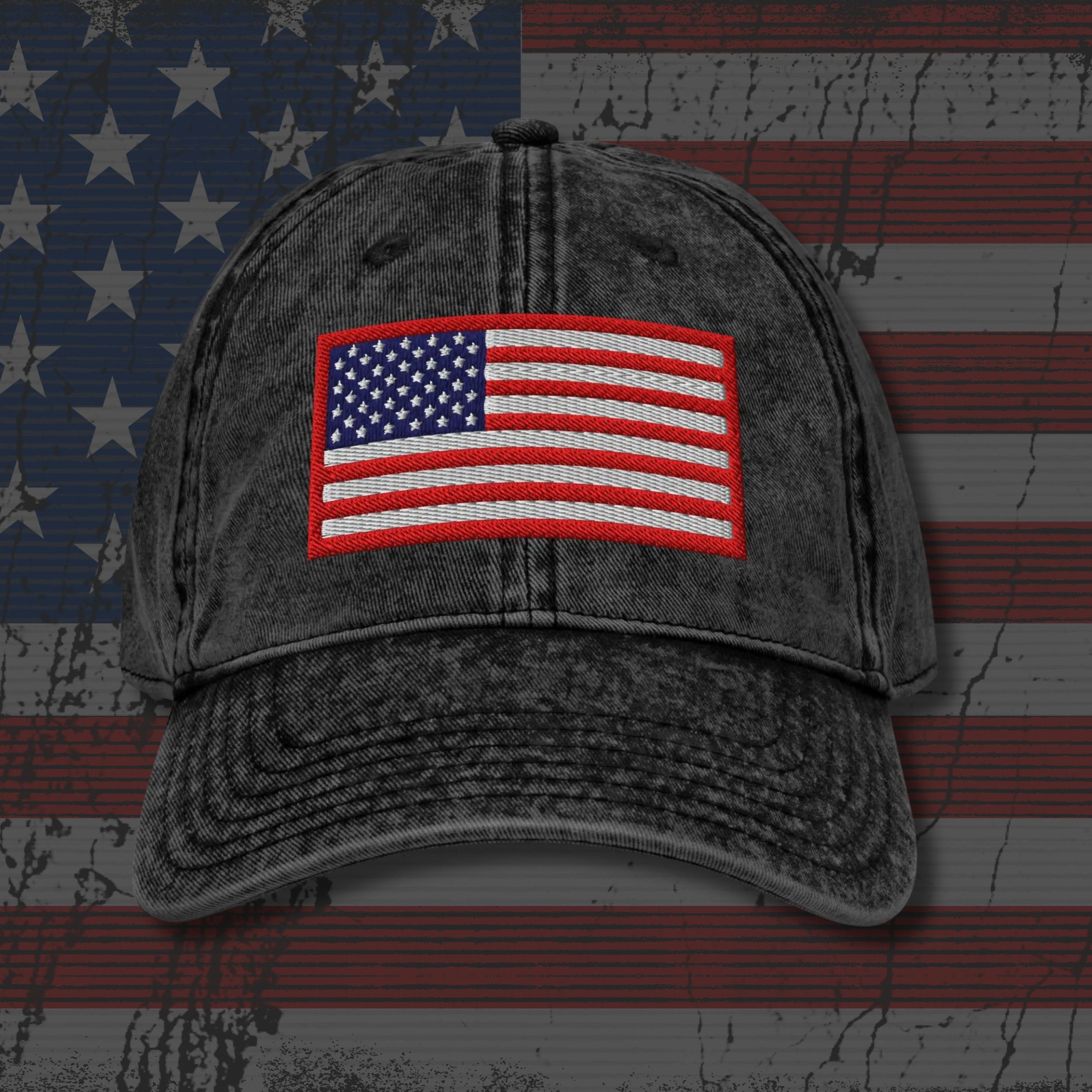 Gray denim cap with American flag patch on a distressed American flag background