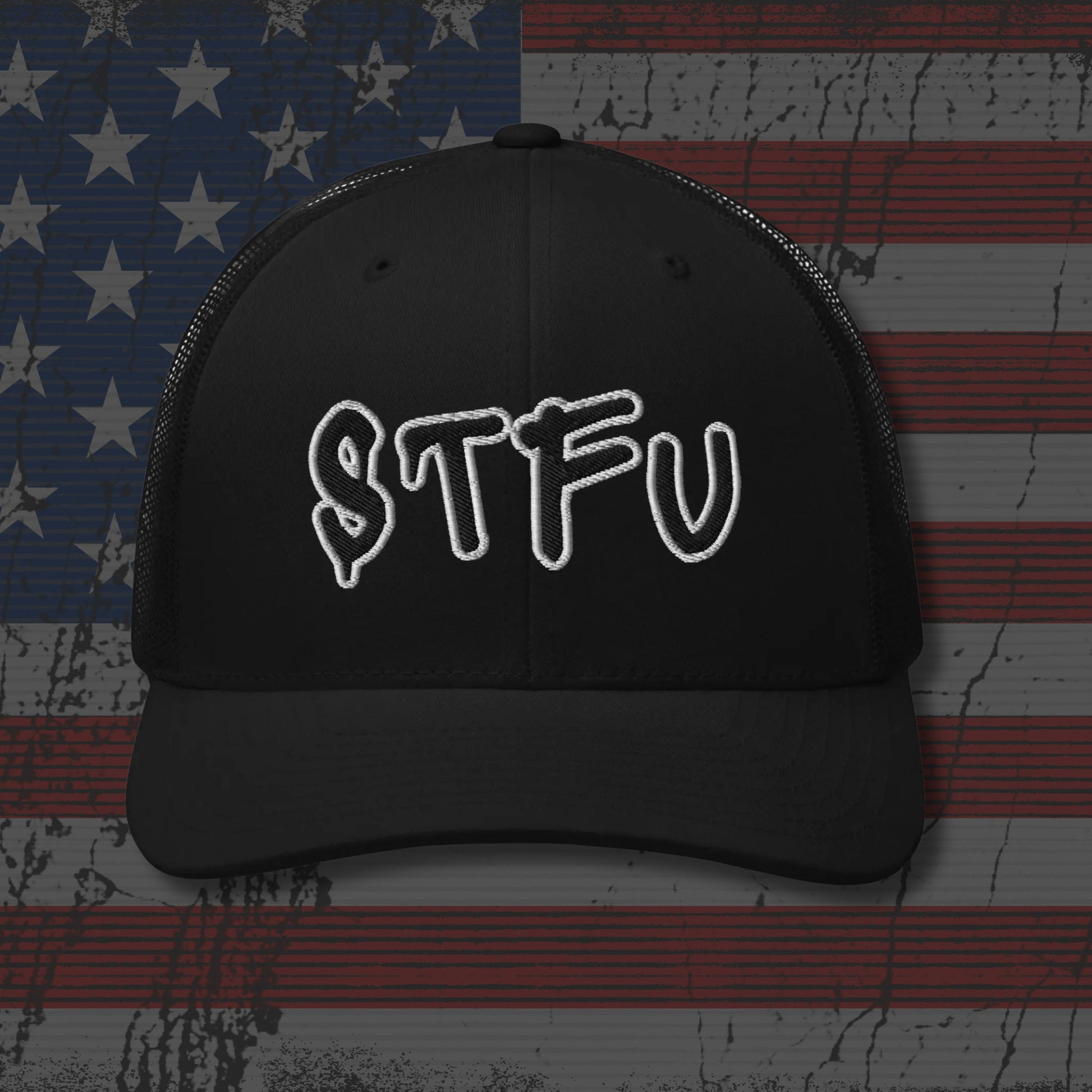 Black cap with 'STFU' text on an American flag background