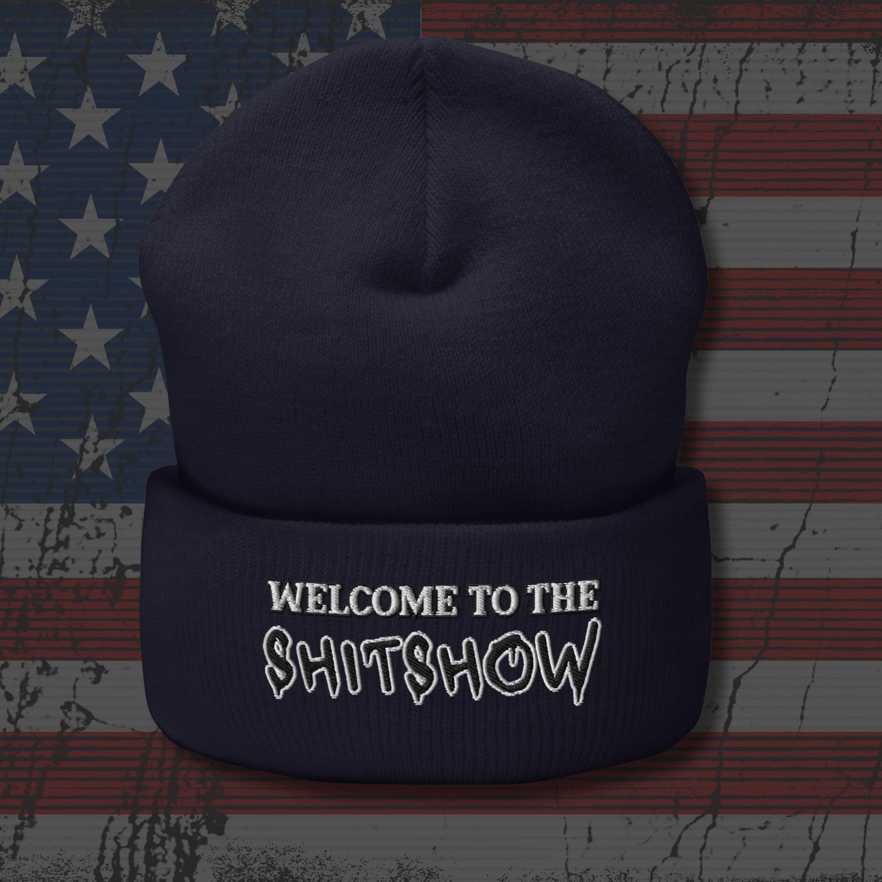 Navy blue beanie with 'Welcome to the Shitshow' text on an American flag background