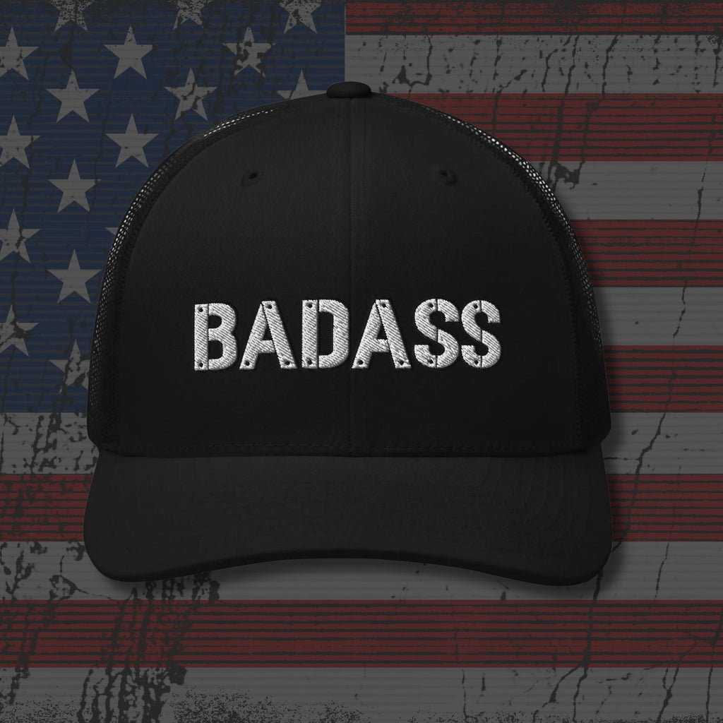 Black cap with 'BADASS' text on an American flag background