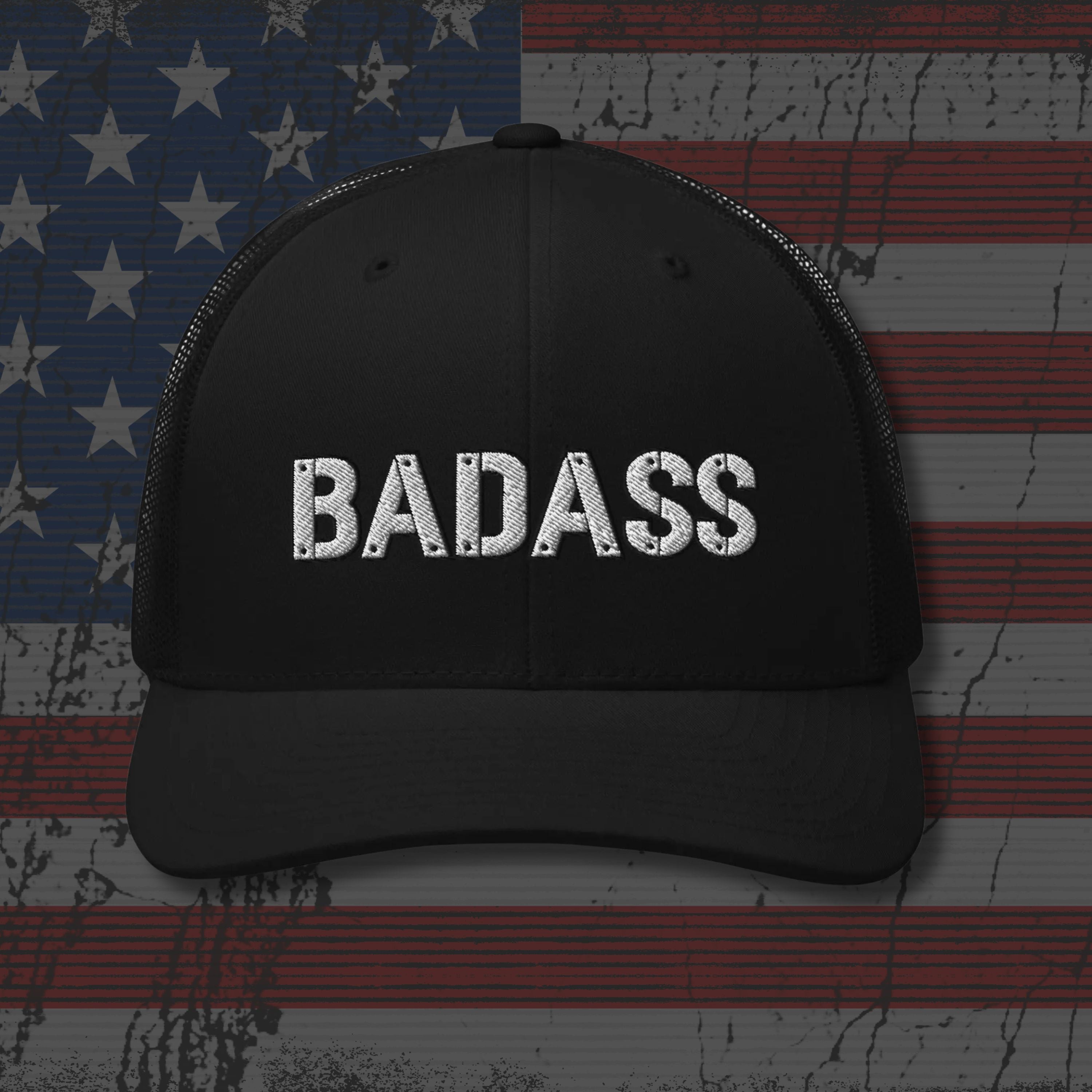 Black cap with 'BADASS' text on an American flag background