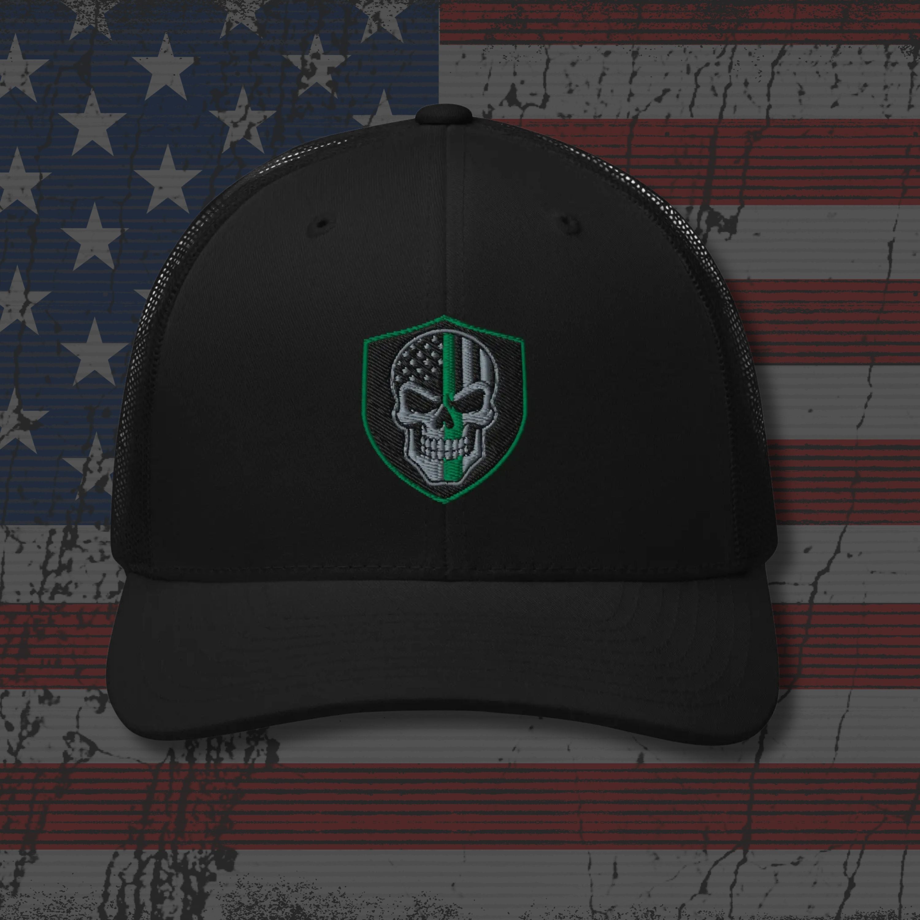 Black cap with a skull emblem on an American flag background