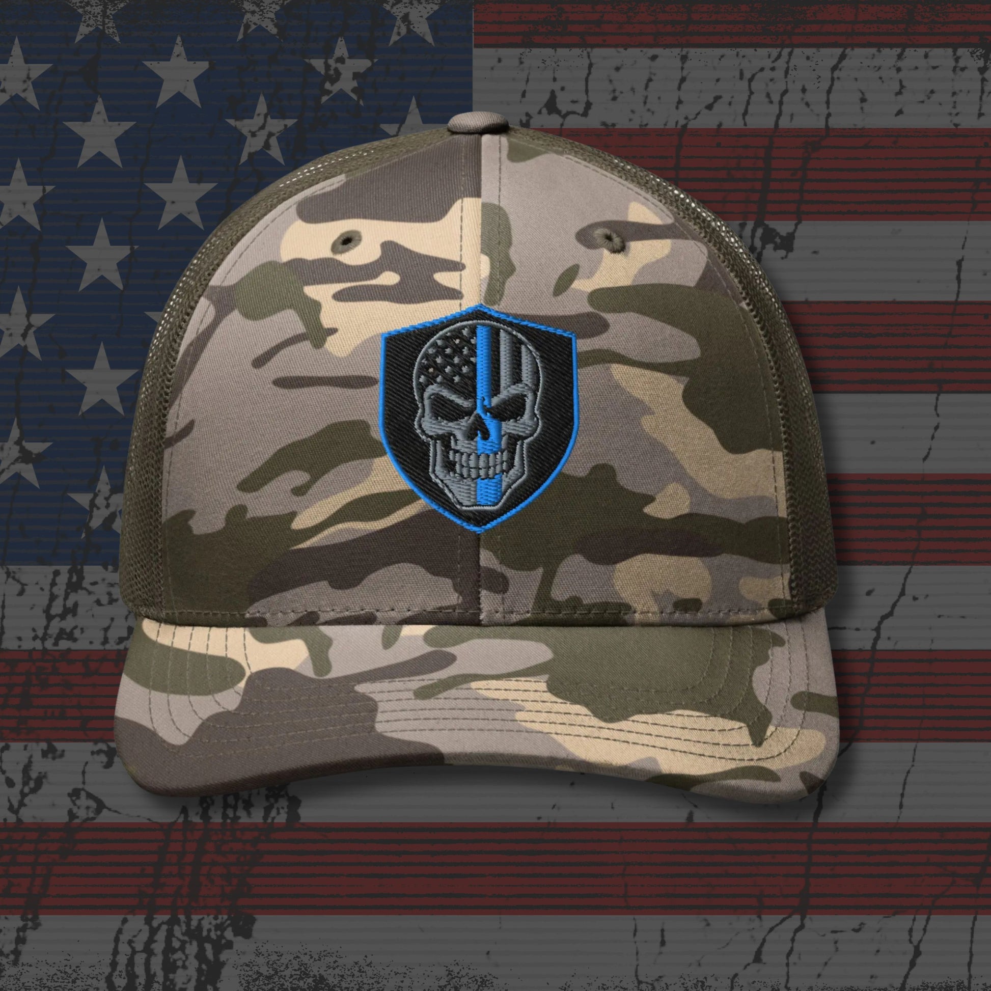 Camouflage cap with a skull emblem on an American flag background